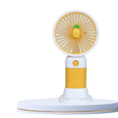 Keep Smiling Cartoon Fruit Fan – Portable Handheld Fan with Phone Holder!