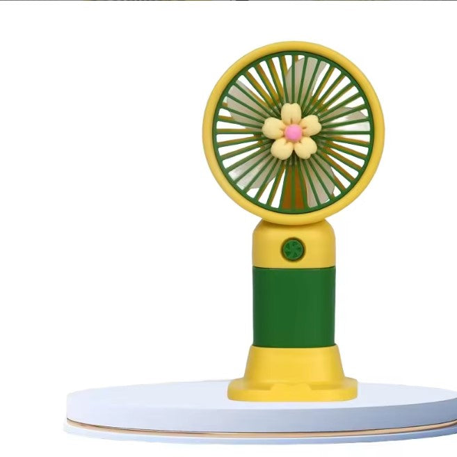 Keep Smiling Cartoon Fruit Fan – Portable Handheld Fan with Phone Holder!